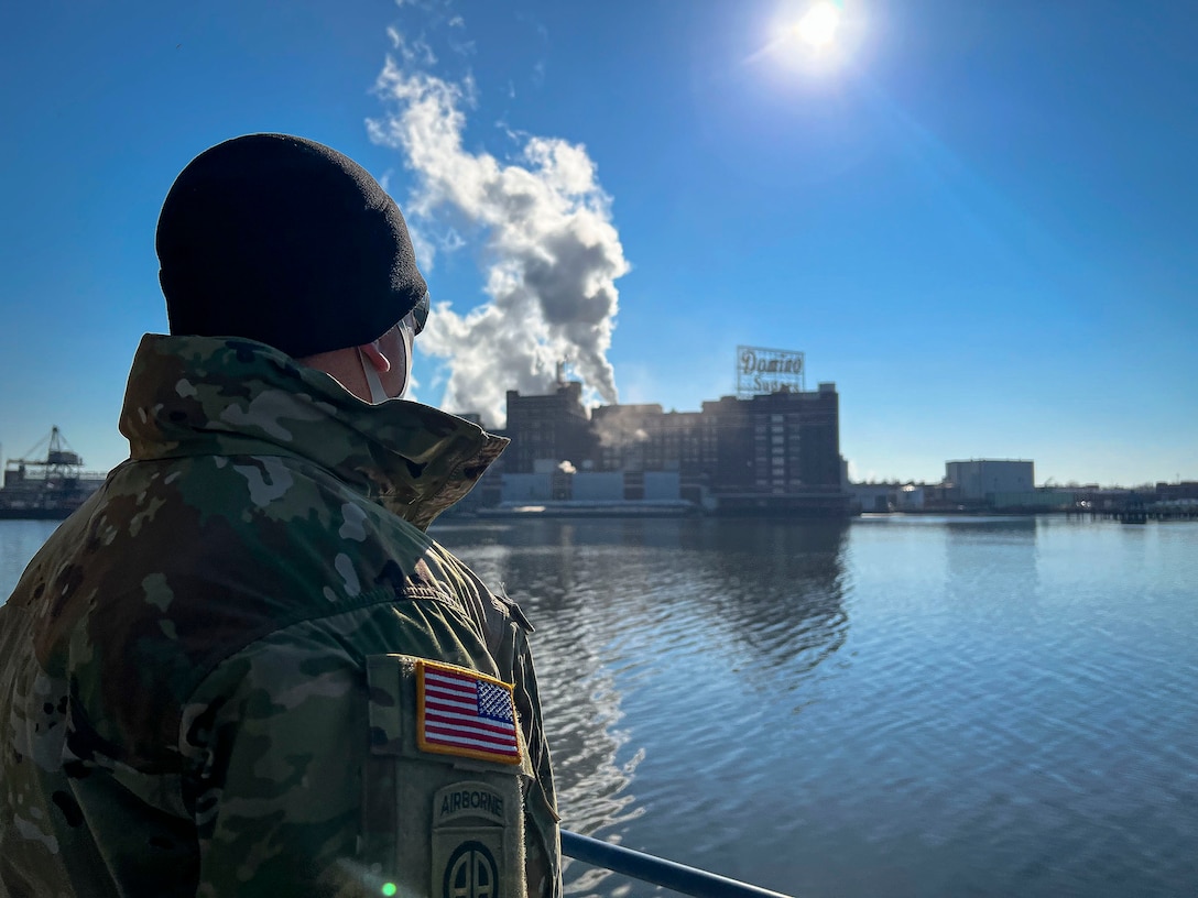 U.S. Army Lt. Col. Doug Massie, a military assistant to the Assistant Secretary of the Army for Civil Works, overlooks Baltimore’s Inner Harbor in transit to the Port of Baltimore in Maryland, Jan. 27, 2022. The ASA-CW establishes policy direction and provides supervision of the Department of the Army functions relating to all aspects of the Civil Works program of the United States Army Corps of Engineers. (U.S. Army photo by Greg Nash)