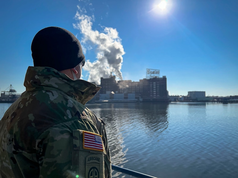U.S. Army Lt. Col. Doug Massie, a military assistant to the Assistant Secretary of the Army for Civil Works, overlooks Baltimore’s Inner Harbor in transit to the Port of Baltimore in Maryland, Jan. 27, 2022. The ASA-CW establishes policy direction and provides supervision of the Department of the Army functions relating to all aspects of the Civil Works program of the United States Army Corps of Engineers. (U.S. Army photo by Greg Nash)