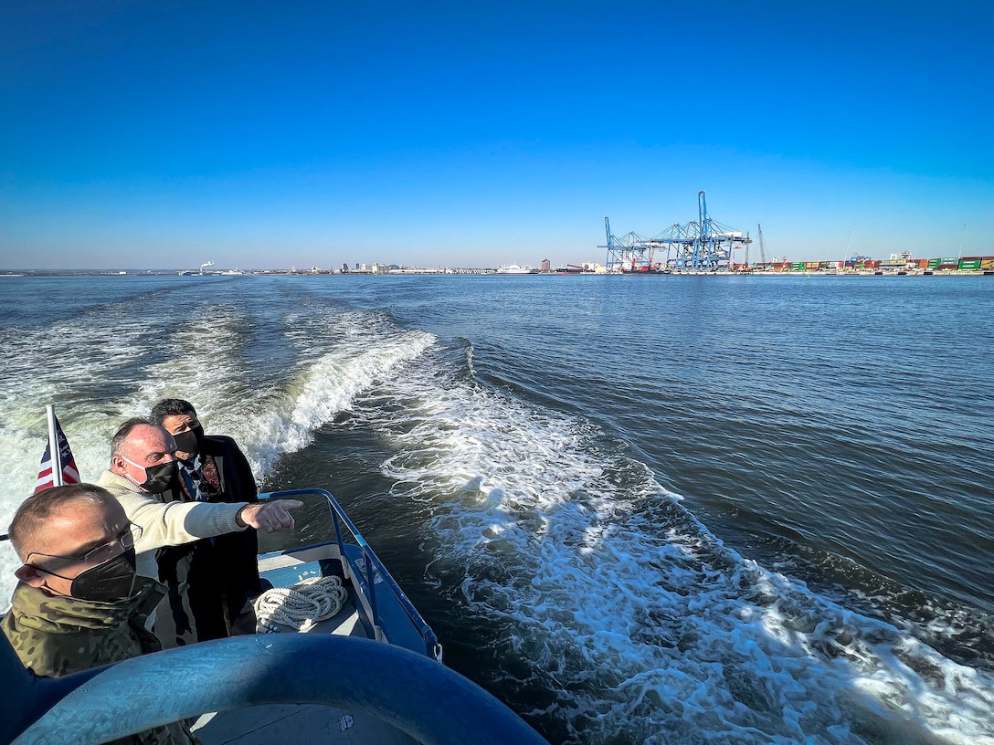 The Honorable Michael Connor, Assistant Secretary of the Army for Civil Works, far back, overlooks Chesapeake Bay freight transportation operations alongside Bill Doyle, Maryland Port Administration executive director, center, and Maj. Gen. William “Butch” Graham, U.S. Army Corps of Engineers Headquarters Deputy Commanding for Civil and Emergency Operations, at the Port of Baltimore in Maryland, Jan. 27, 2022. Doyle immersed USACE and ASA-CW leadership into the port’s Dundalk and Seagirt Terminal operations to showcase how the USACE Baltimore District’s Chesapeake Bay protection and restoration efforts enhance economic impacts. (U.S. Army photo by Greg Nash)