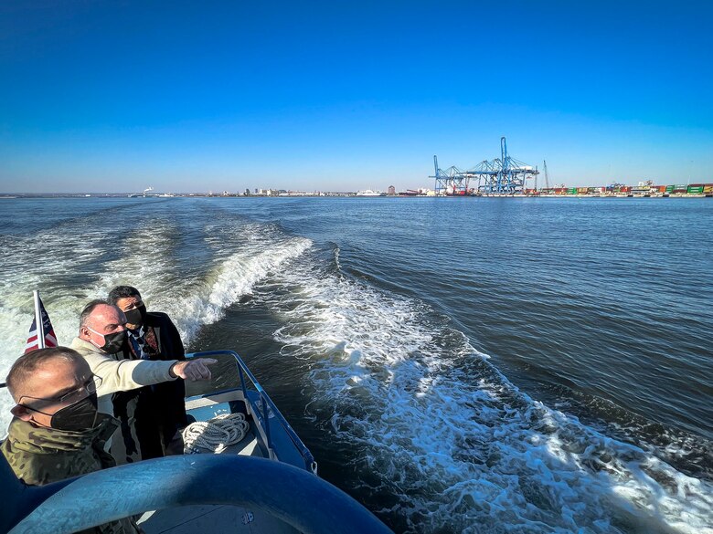 The Honorable Michael Connor, Assistant Secretary of the Army for Civil Works, far back, overlooks Chesapeake Bay freight transportation operations alongside Bill Doyle, Maryland Port Administration executive director, center, and Maj. Gen. William “Butch” Graham, U.S. Army Corps of Engineers Headquarters Deputy Commanding for Civil and Emergency Operations, at the Port of Baltimore in Maryland, Jan. 27, 2022. Doyle immersed USACE and ASA-CW leadership into the port’s Dundalk and Seagirt Terminal operations to showcase how the USACE Baltimore District’s Chesapeake Bay protection and restoration efforts enhance economic impacts. (U.S. Army photo by Greg Nash)