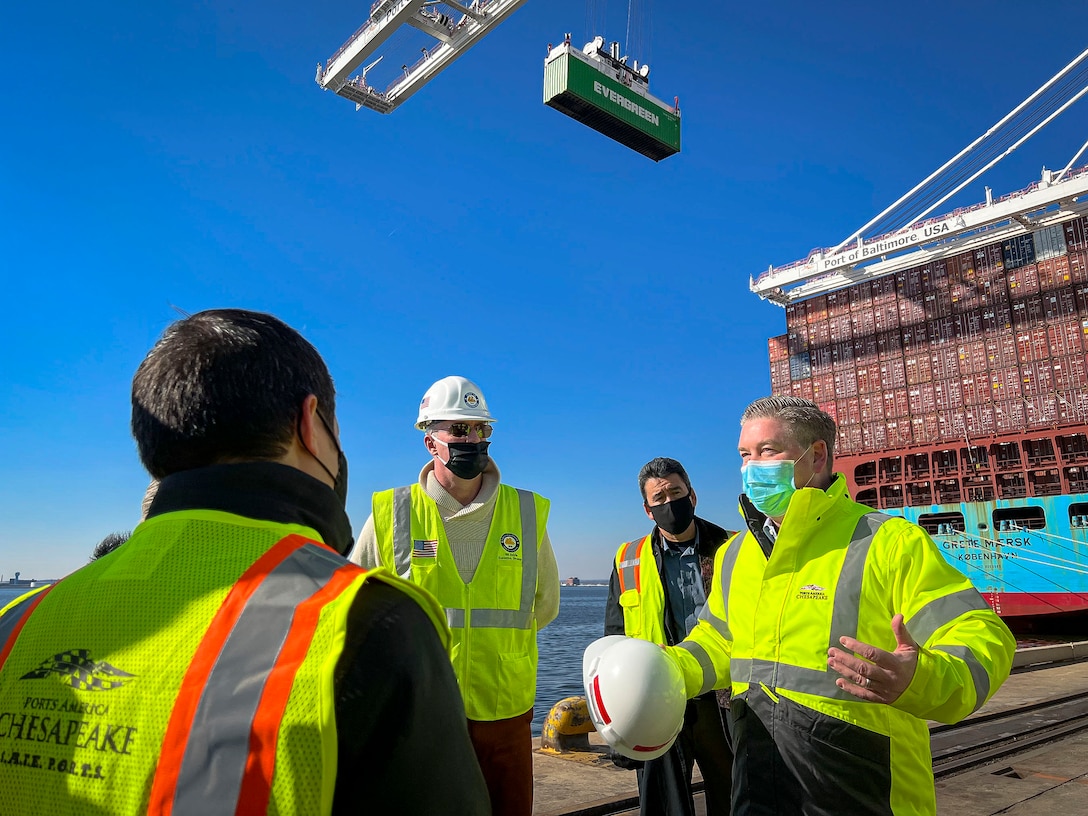 Bayard Hogans, Ports America Chesapeake Vice President, far right, briefs mission partners on the Dundalk and Seagirt Marine Terminal's Neo-Panamax crane's operational benefits during a Port of Baltimore tour in Maryland, Jan. 27, 2022. The Honorable Michael Connor, Assistant Secretary of the Army for Civil Works, second from right, conducted his first port visit since confirming his position in November 2021. He accompanied senior leaders from the U.S. Army Corps of Engineers Headquarters and North Atlantic Division to witness the Baltimore District's Chesapeake Bay restoration and protection tactics. (U.S. Army photo by Greg Nash)