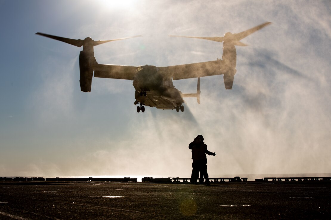 A U.S. Marine Corps MV-22 Osprey with Marine Medium Tiltrotor Squadron 263, lands aboard the USS Kearsarge (LHD 3) flight deck during Composite Training Unit Exercise, Jan. 30, 2022. COMPTUEX is the last at-sea period of the ARG/MEU Predeployment Training Program. COMPTUEX is the final certifying step before the ARG/MEU team demonstrate its readiness to deploy.