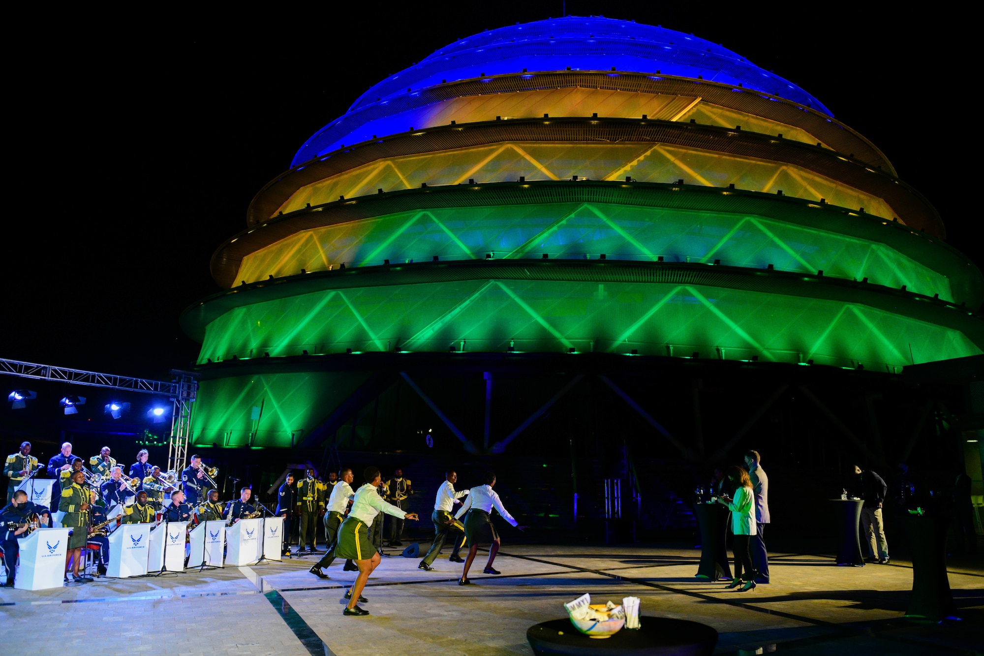 Dancers with the Rwanda Defence Force Band perform with members of the U.S. Air Forces in Europe band during the 2022 African Air Chief Symposium social in Kigali, Rwanda, Jan. 24, 2022. The symposium aims to increase the number of partner nations involved in the Association of African Air Forces. (U.S. Air Force photo by Senior Airman Brooke Moeder)