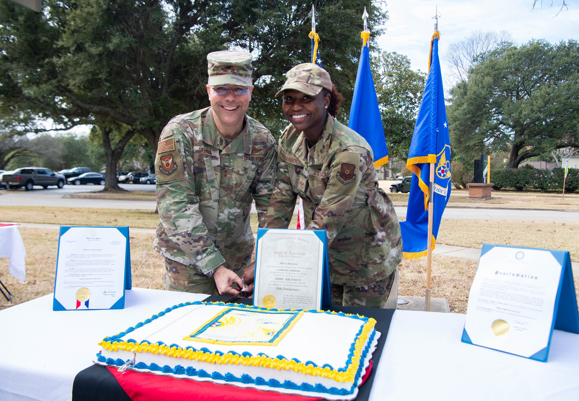 Maj. Gen. Andrew Gebara, 8th Air Force and Joint-Global Strike Operations Center commander, left, and Senior Airman Mikayla Barber, 8th Air Force commander support staff, take part in an Air Force tradition -- having the most senior and junior ranking member cut a cake during the 8th Air Force’s 80th anniversary celebration at Barksdale Air Force Base, La., February 1, 2022. Members from around 8th Air Force and the J-GSOC were in attendance to celebrate this momentous occasion. (U.S. Air Force photo by Staff Sgt. Bria Hughes)