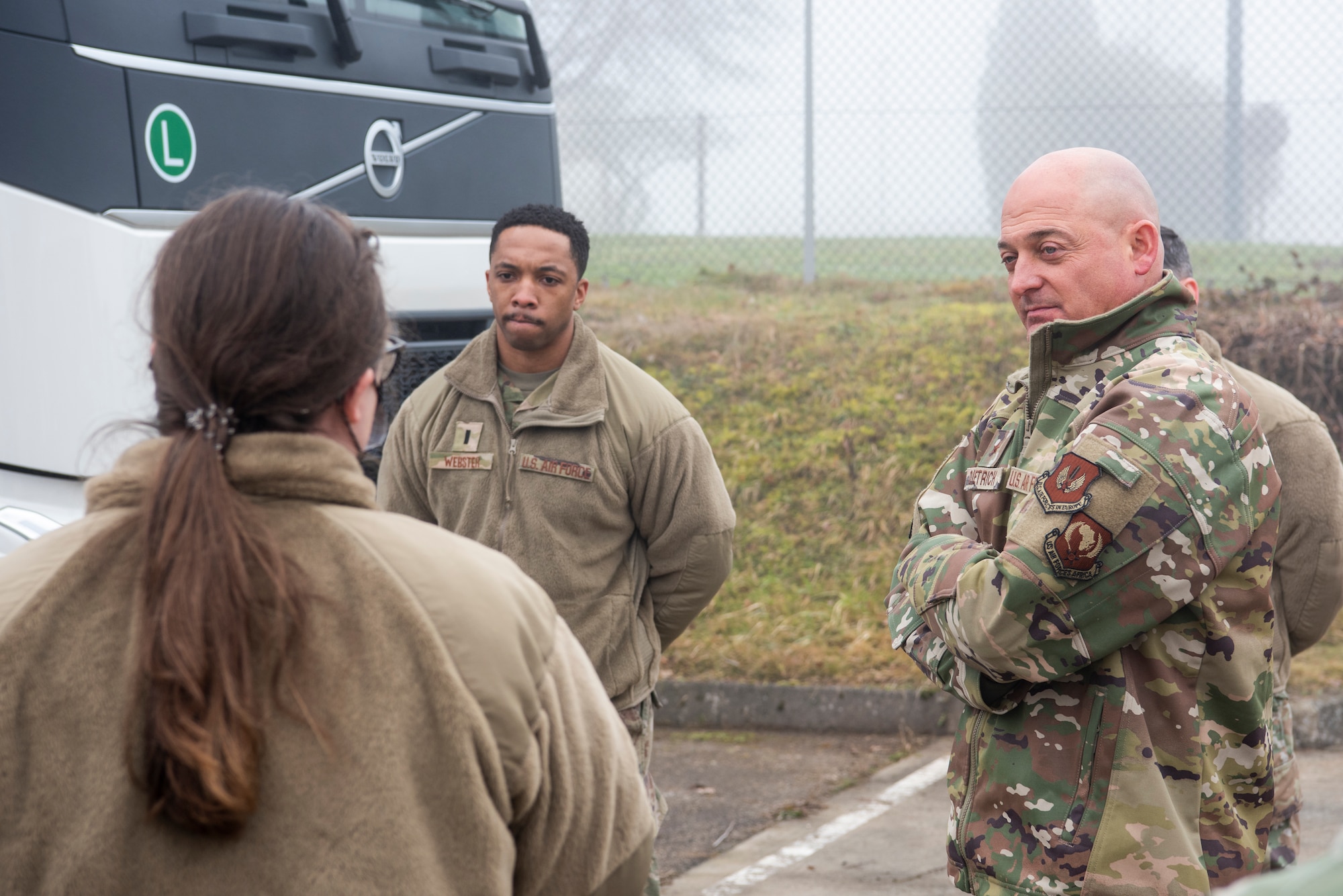 U.S. Air Force Brig. Gen. George T. Dietrich III, U.S. Air Forces in Europe - Air Forces Africa director of logistics, engineering and force protection, right, receives a brief from Maj. Katherine Wilson, 52nd Logistics Readiness Squadron director of operations, on the Ground Agile Transportation Employment course, Jan. 25, 2022, at Spangdahlem Air Base, Germany.