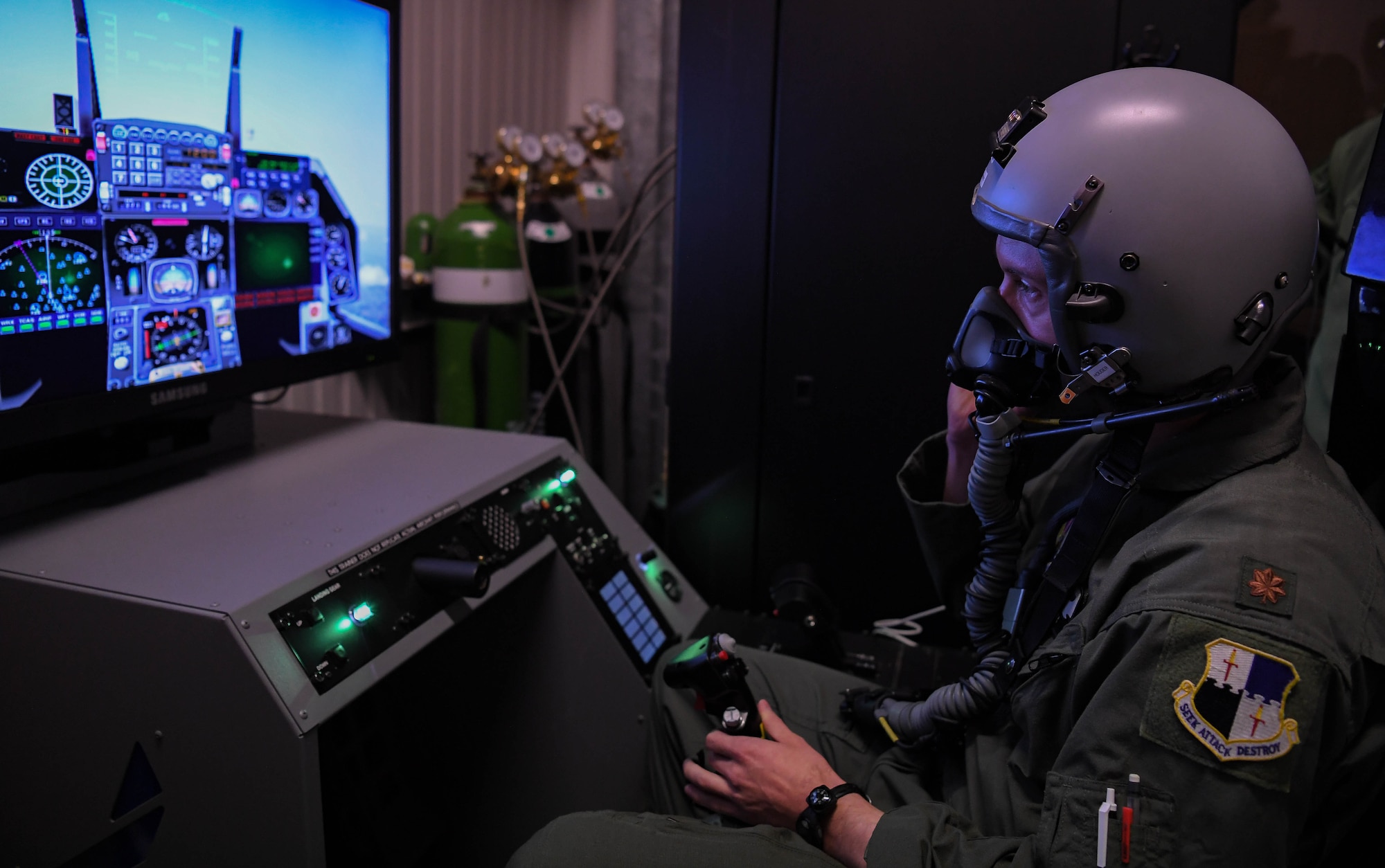 A pilot assigned to the 480th Fighter Squadron at Spangdahlem Air Base, Germany, undergoes physiological refresher training at Ramstein Air Base, Germany, Jan. 27, 2022. The hypoxia familiarization training puts pilots through a simulated flying experience in an unpressurized environment, restricting the amount of oxygen in the cabin. This training allows pilots to become familiar with hypoxia symptoms and emergency procedures that allow them to continue flying the aircraft under these circumstances. (U.S. Air Force photo by Airman 1st Class Jared Lovett)
