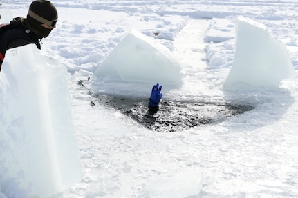 The U.S. Navy is working alongside the U.S. Coast Guard to host an annual ice dive training course on Camp Ripley in Minnesota Jan. 29-Feb. 10, 2022. The course provides real-world ice and cold weather dive training in arctic conditions.