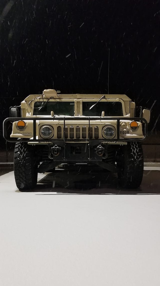 An Oklahoma National Guard humvee is parked in Stroud, Oklahoma, Feb. 14, 2021, in preparation for stranded motorist recovery missions along the Turner Turnpike. (Oklahoma National Guard photo by Sgt. Anthony Jones)