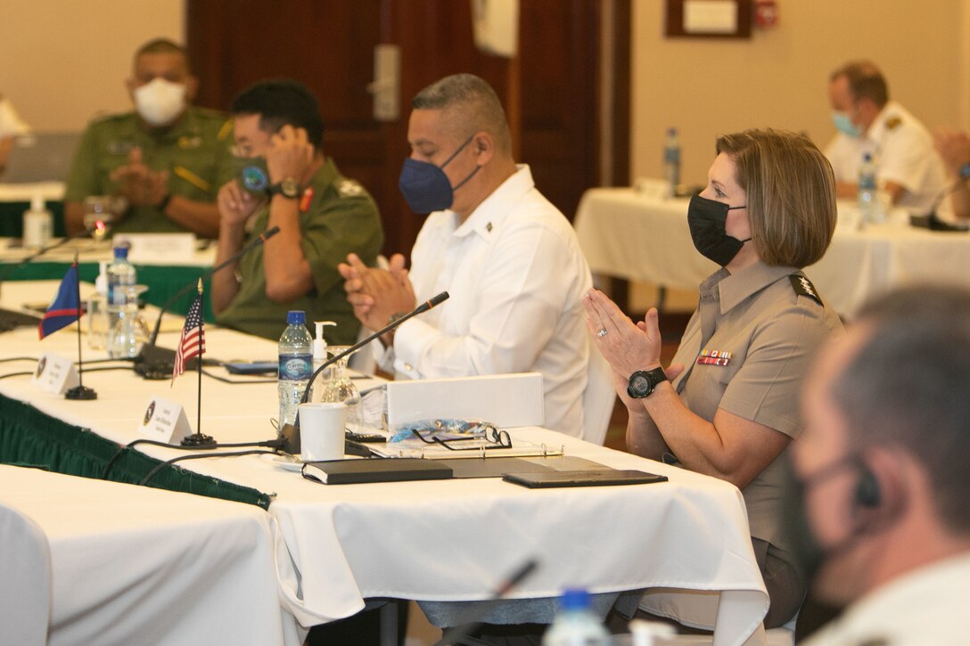 Army Gen. Laura J. Richardson, commander of U.S. Southern Command, and Hon. Oscar Mira, Minister of State, Belize Ministry of National Defence, applaud during the opening ceremony of the the 2022 Central American Security Conference February 1, 2022 in Belize City, Belize.