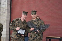 AAS SgtMaj Earl Budd and Maj Daniel Petronzio accept a plaque from the volunteers and their families from RNDC.