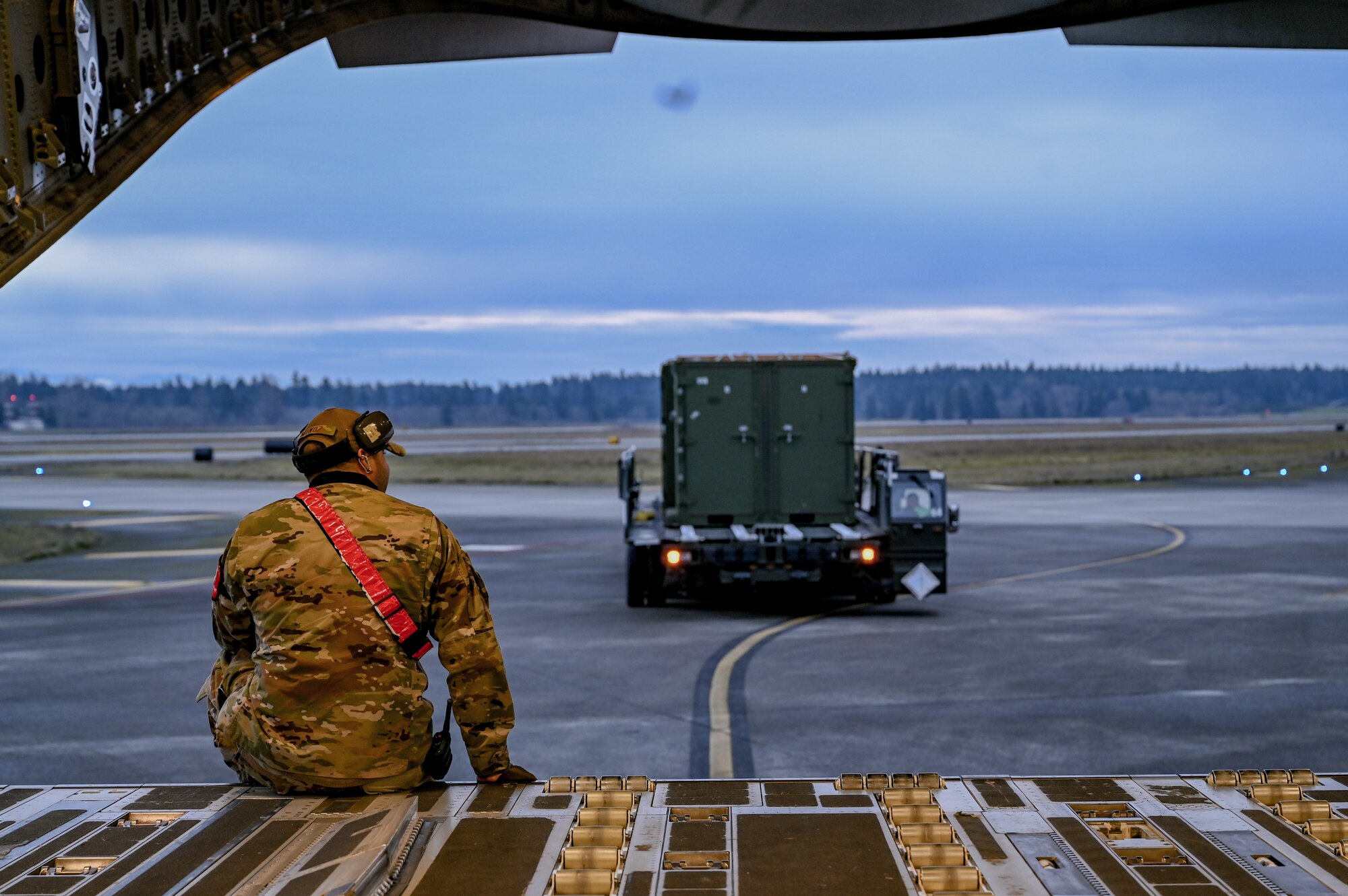 Airmen load an aircraft.