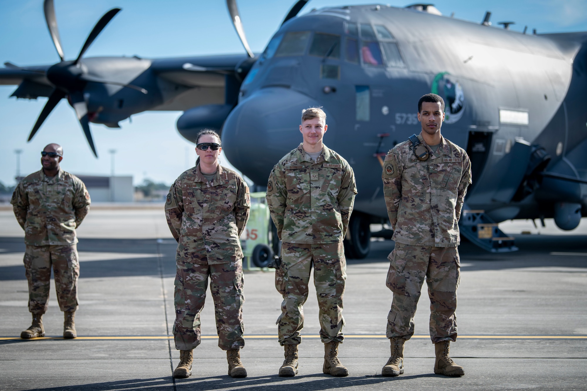 U.S. Air Force Staff Sgt. Jillian Martin, left, a 73rd Aircraft Maintenance Unit weapons load crew chief, U.S. Air Force Senior Airman David Robinson, center, and U.S. Air Force Senior Airman Adrian Bethea, right, 73rd AMU load crew members, are introduced during the 2022 Weapons Load Crew of the Year Competition, Jan. 31, 2022, at Hurlburt Field, Florida.