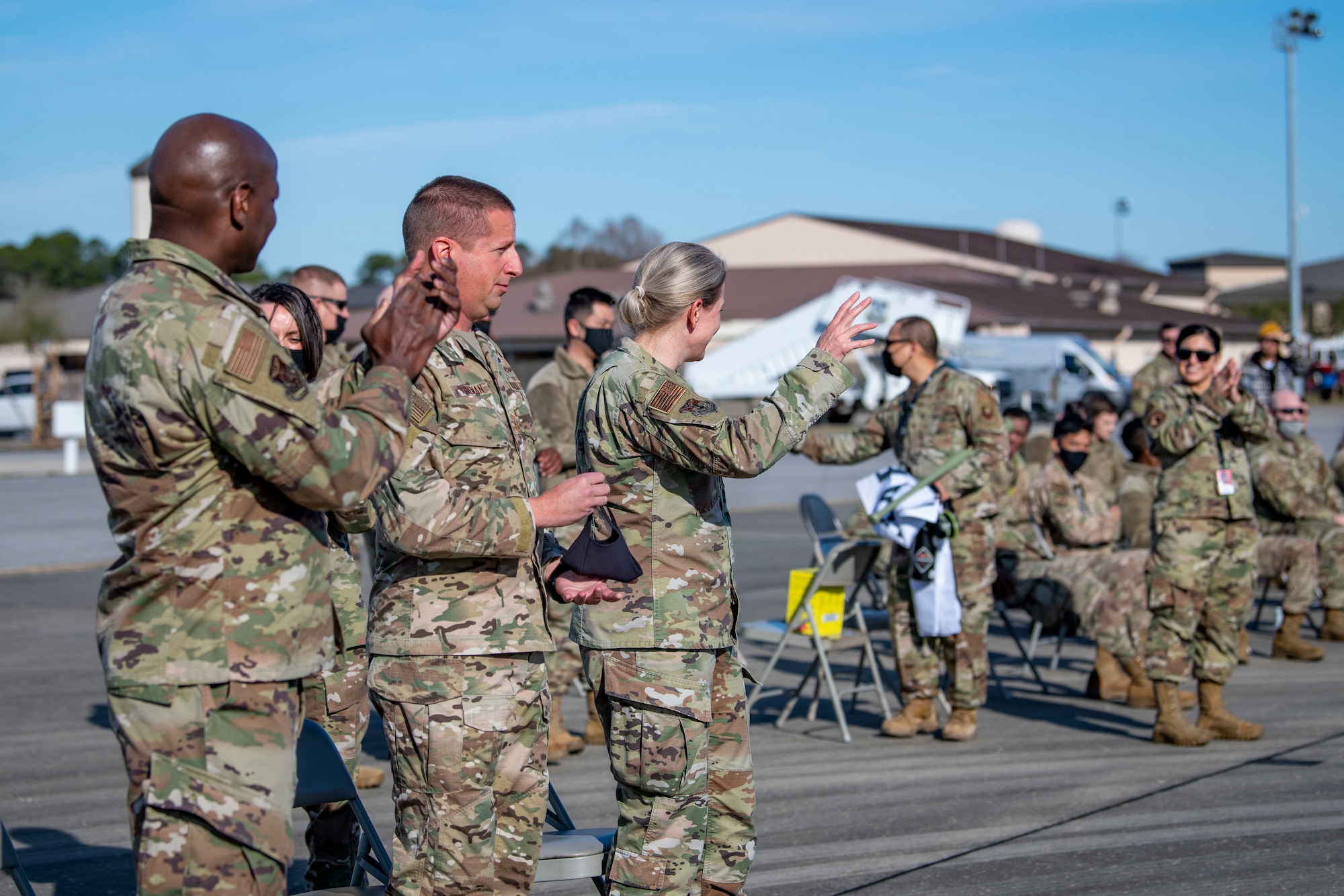 Members of the 1st Special Operations Maintenance Group welcome U.S. Air Force Col. Jocelyn Schermerhorn, 1st Special Operations Wing commander, to the 2022 Weapons Load Crew of the Year Competition, Jan. 31, 2022, at Hurlburt Field, Florida.