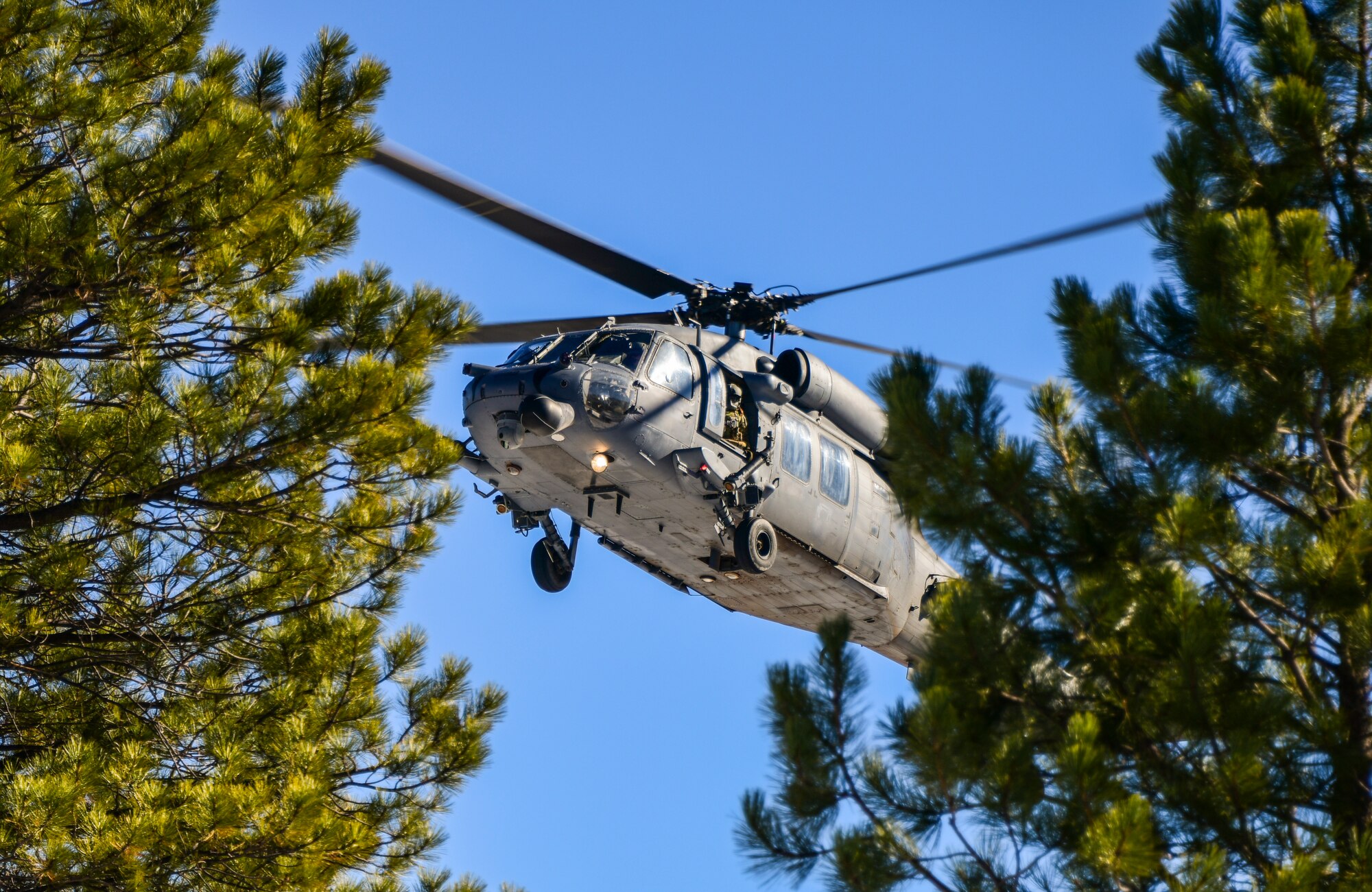 A photo of a flying helicopter