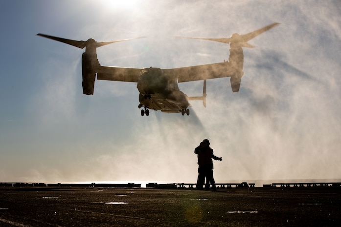 A U.S. Marine Corps MV-22 Osprey with Marine Medium Tiltrotor Squadron 263, lands aboard the USS Kearsarge (LHD 3) flight deck during Composite Training Unit Exercise (COMPTUEX), Jan. 30, 2022. COMPTUEX is the last at-sea period of the ARG/MEU Predeployment Training Program. COMPTUEX is the final certifying step before the ARG/MEU team demonstrate its readiness to deploy. (U.S. Marine Corps photo by Cpl. Yvonna Guyette)