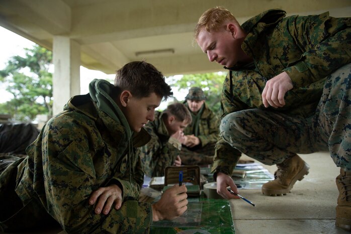 Sgt. Edgar Alvarez, a scout sniper with Battalion Landing Team 1/5, 31st Marine Expeditionary Unit gathers necessary gear for a two-day area reconnaissance mission at the Jungle Warfare Training Center in Okinawa, Japan, Jan. 11, 2022. Scout snipers play an integral part in the Stand in Force Concept operating as the eyes and ears of the ground force commander, allowing for a more efficient decision making process. The 31st MEU, the Marine Corps' only continuously forward-deployed MEU, provides a flexible and lethal force ready to perform a wide range of military operations as the premiere crisis response force in the Indo-Pacific region.