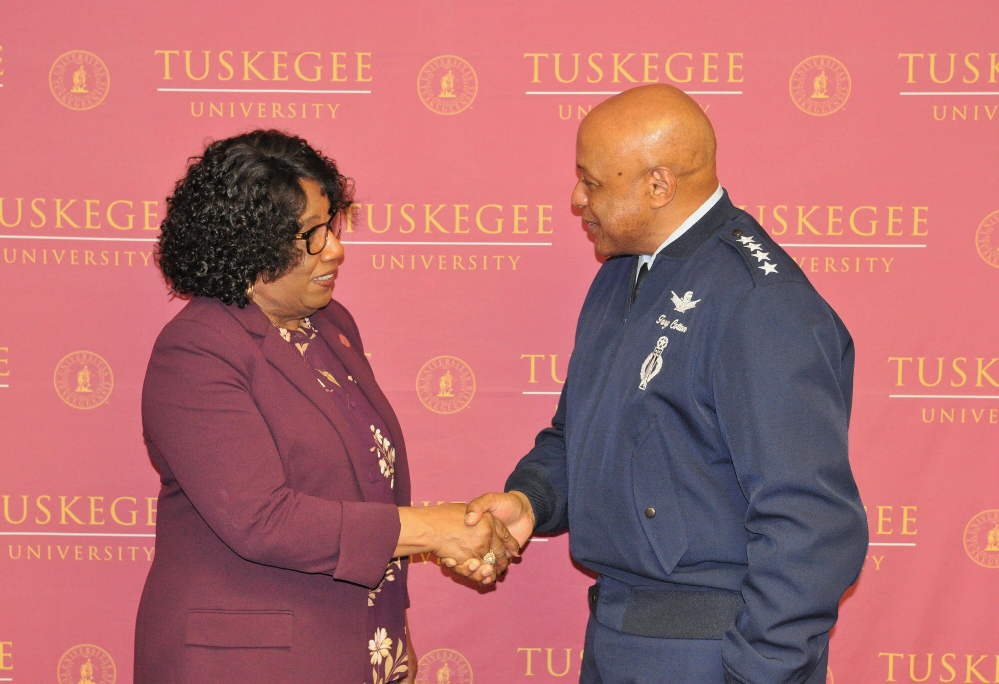 Dr. Charlotte Morris, president, Tuskegee University, right, shakes the hand of Gen. Anthony Cotton, commander, Air Force Global Strike Command, left, after they discussed the establishment of Project Tuskegee. Project Tuskegee is a partnership between AFGSC and the university where Air Force Reserve Officer Training Corps cadets are exposed to the opportunities available as an AFGSC “Striker.” (Air Force Courtesy Photo)