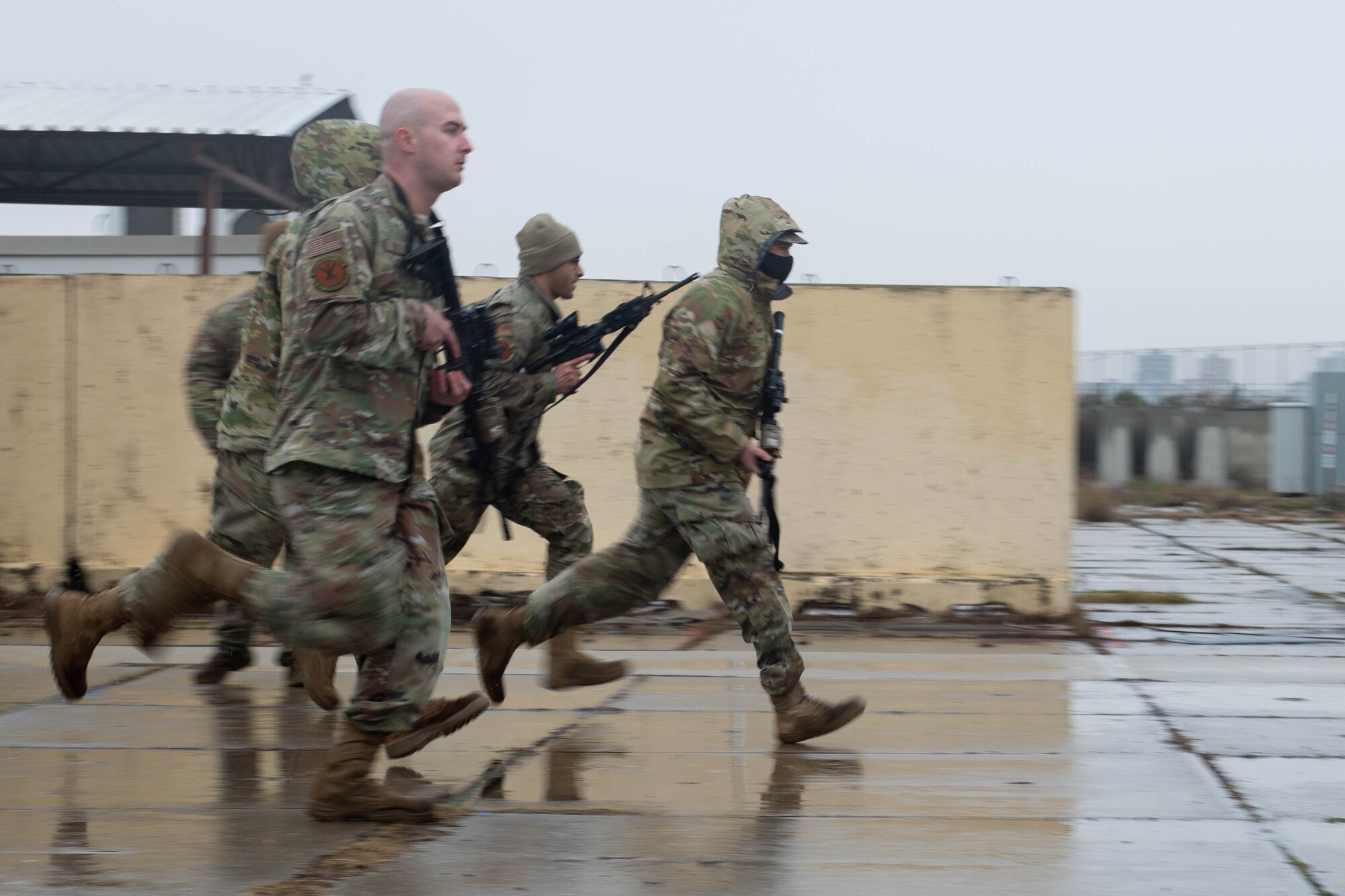 Airmen sprint to cover during ACE Training