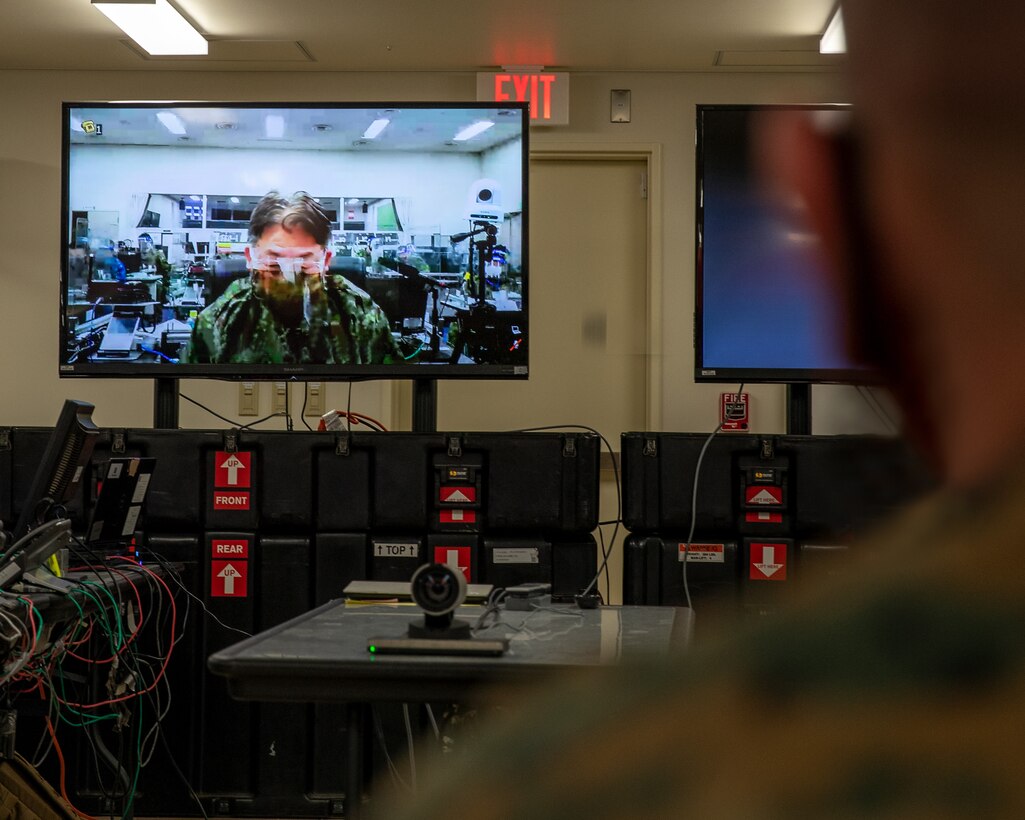 U.S. Marine Corps Lt. Gen. James W. Bierman, the III Marine Expeditionary Force Commanding General, and Japan Self-Defense Force LTG Ryoji Takemoto, the Western Army Commanding General, collaboratively lead a virtual bilateral operations confirmation brief during exercise Keen Edge 22, Feb. 2, 2022.  Keen Edge 22 was a bilateral command post exercise conducted Jan. 27 through Feb. 3, 2022. The exercise is an annual event that improves interagency coordination, combat readiness and interoperability of all participants. This U.S.-Japan exercise series alternates between field training exercises (i.e., Keen Sword) and command post exercises (i.e., Keen Edge). (U.S. Marine Corps photo illustration by Cpl. Francesca Landis)