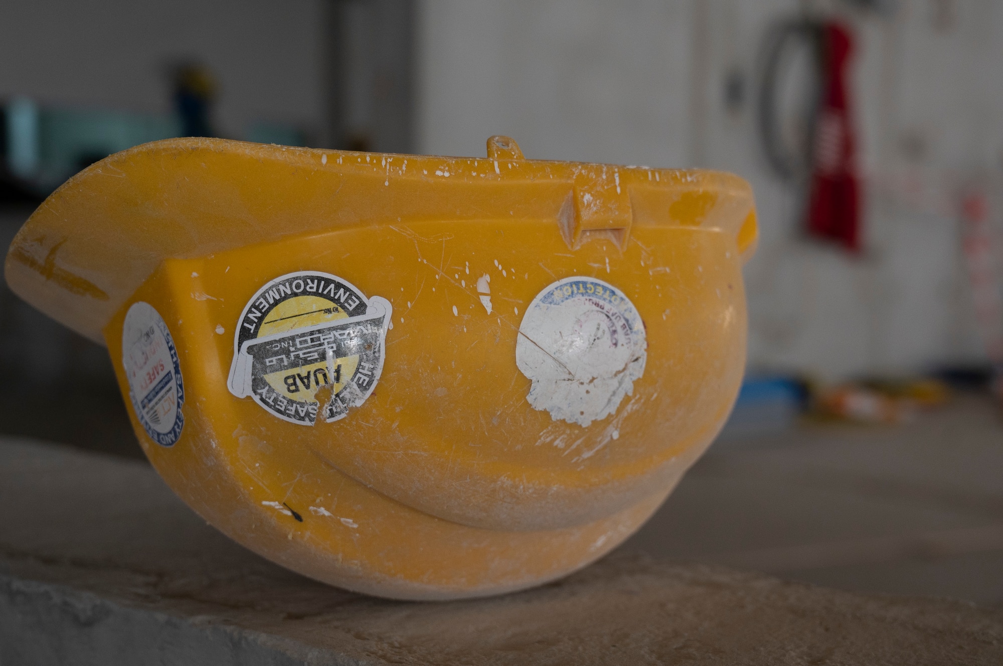 A hard hat rests at a Qatar Emiri Corps of Engineers construction site at Al Udeid Air Base, Qatar