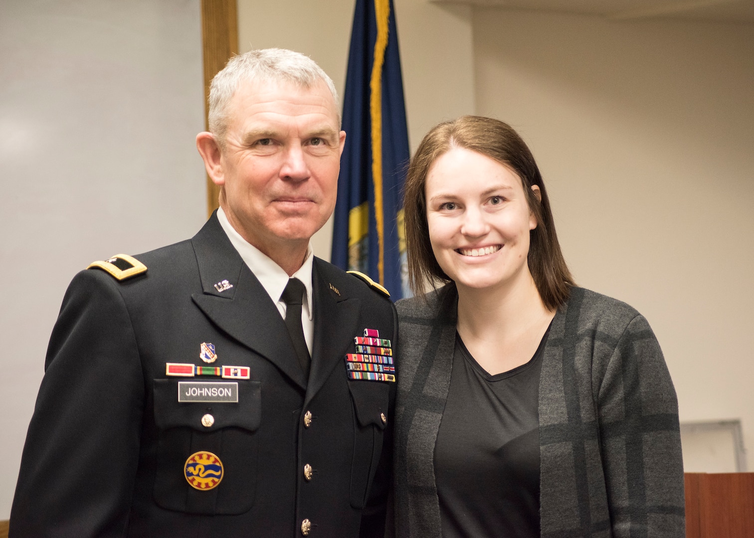 Idaho Army National Guard Brig. Gen. Russell Johnson and his daughter, 2nd Lt. Marah Sharpe, on Gowen Field in Boise, Idaho, Jan. 28, 2022, after Johnson administered the oath of commissioning to Sharpe. Russell is retiring from the Guard in March after more than 40 years of service just as his daughter begins her career in the same organization.