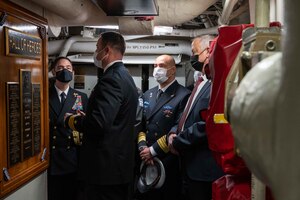 220203-N-OC333-2069 MANAMA, Bahrain (Feb. 3, 2022) Vice Adm. Brad Cooper commander of U.S. Naval Forces Central Command, U.S. 5th Fleet and Combined Maritime Forces, left, Israel Minister of Defense H.E. Benjamin Gantz and Commander in Chief of the Israeli Navy Vice Adm, Saar Salama visit guided-missile destroyer USS Cole (DDG 67) in Manama, Bahrain, Feb. 3. Cooper welcomed senior government officials from the United States, Bahrain and Israel for a trilateral meeting on regional maritime security cooperation.