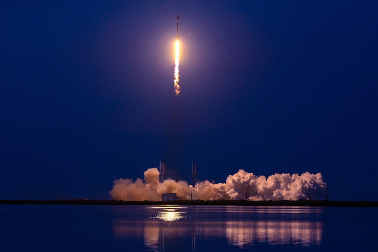 A rocket launches into space.