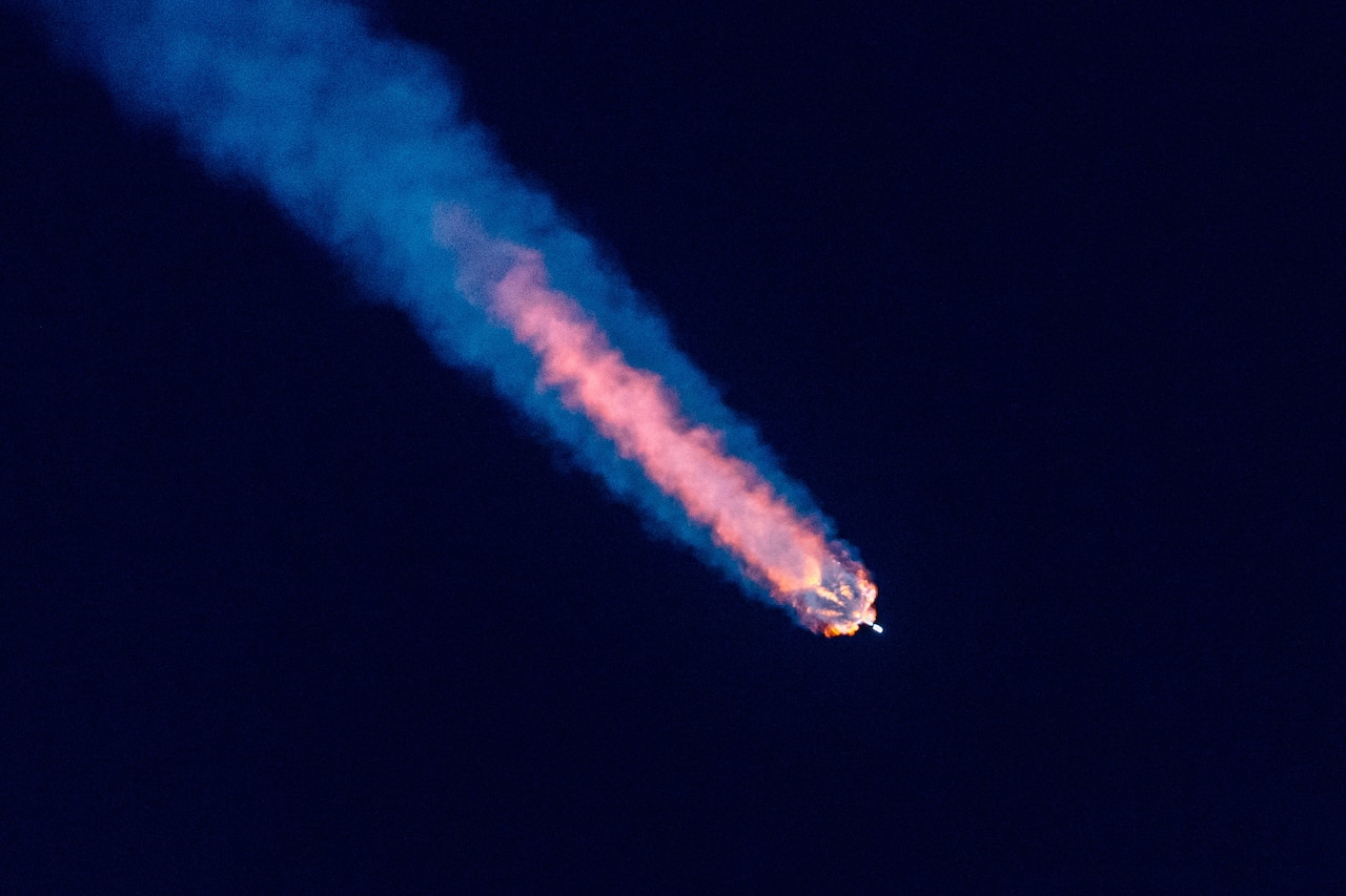 A rocket launches into space.