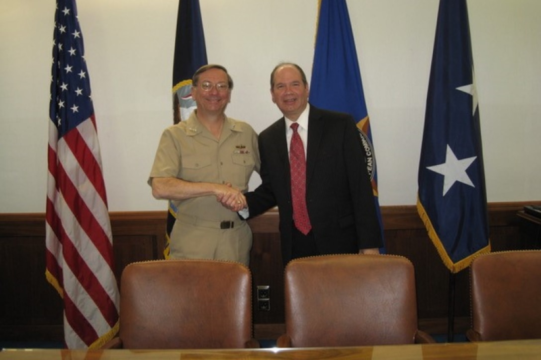 Danoy greets Vice Adm. Charles Martoglio, the deputy commander of U.S. European Command.