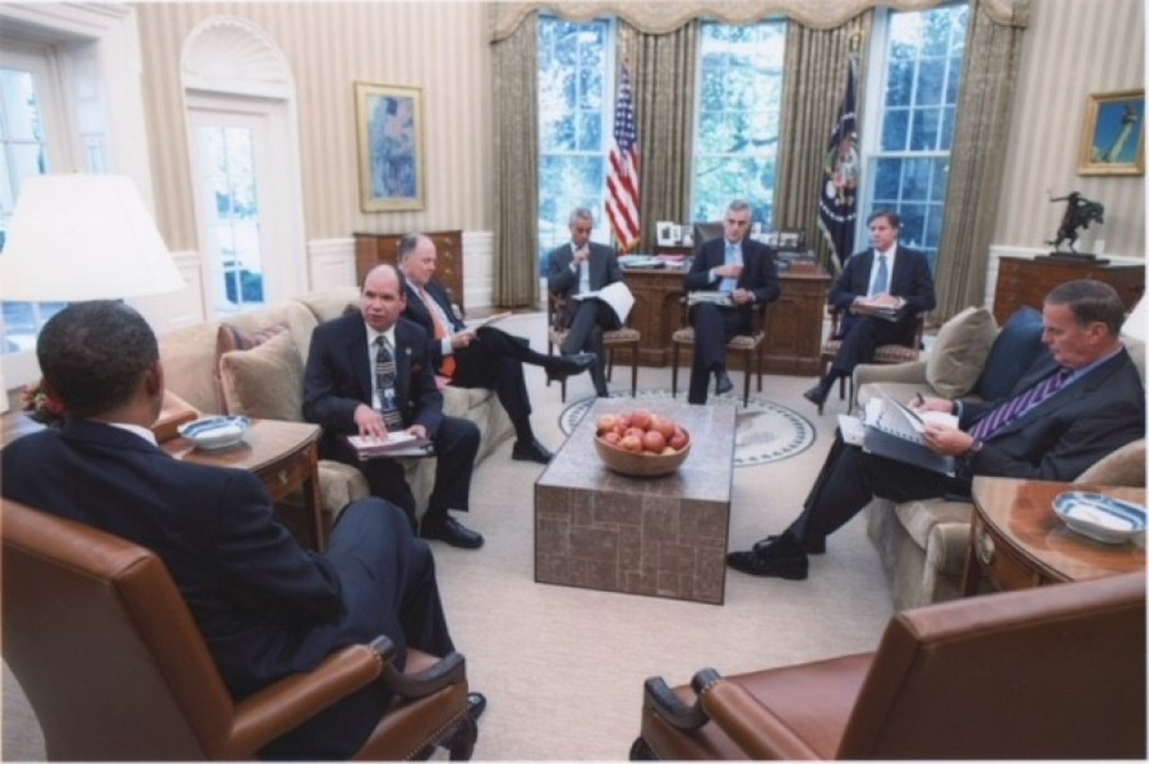 Danoy briefs President Obama in the Oval Office