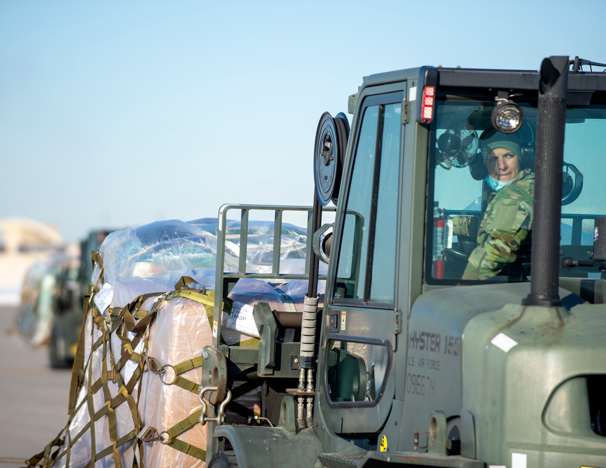 U.S. Air Force Staff Sgt. Marissa Ricci, 133rd Air Transportation Function, drives a forklift in St. Paul, Minn., Jan. 20, 2022.