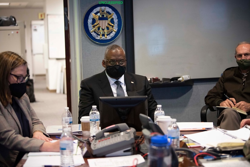 Secretary of Defense Lloyd J. Austin III in a meeting.