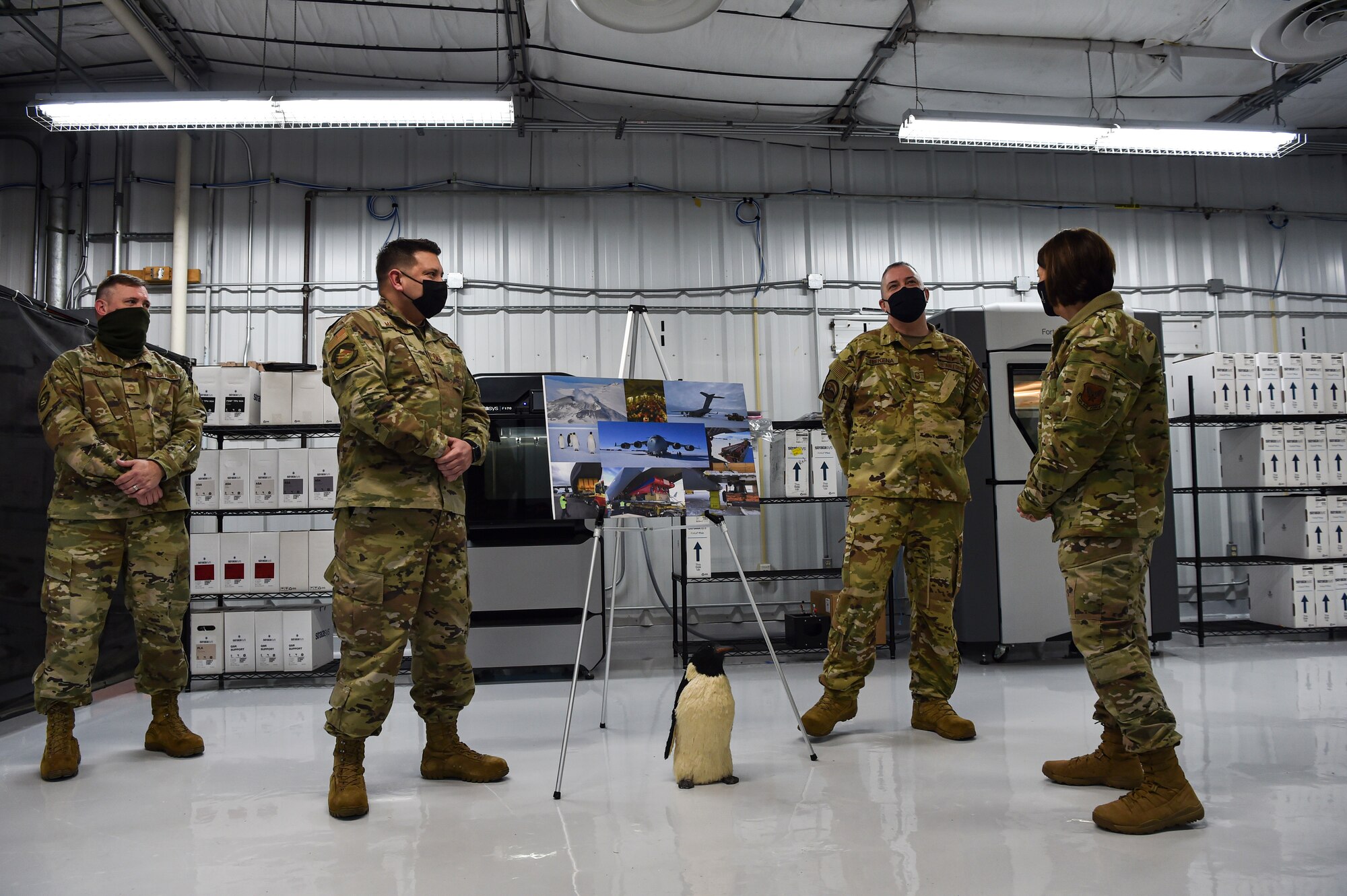 Chief Master Sergeant of the Air Force JoAnne S. Bass engages with 446th Airlift Wing Airmen during her visit to McChord Field at Joint Base Lewis-McChord, Washington, Feb. 1, 2022. Bass toured several McChord units and recognized Airmen for excellent performance. (U.S. Air Force photo by Staff Sgt. Tryphena Mayhugh)