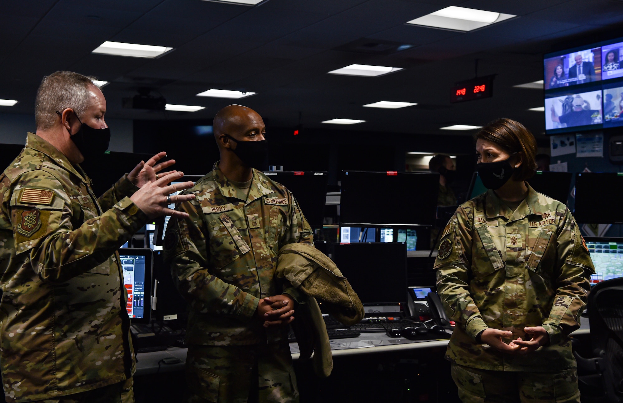 Chief Master Sergeant of the Air Force JoAnne S. Bass and Chief Master Sgt. Nathaniel Perry, Air Force First Sergeant Special Duty manager, learn about the Western Air Defense Sector mission and operation from Col. Scott Humphrey, WADS commander, during her visit to McChord Field at Joint Base Lewis-McChord, Washington, Feb. 1, 2022. Bass toured several McChord units and recognized Airmen for excellent performance. (U.S. Air Force photo by Staff Sgt. Tryphena Mayhugh)