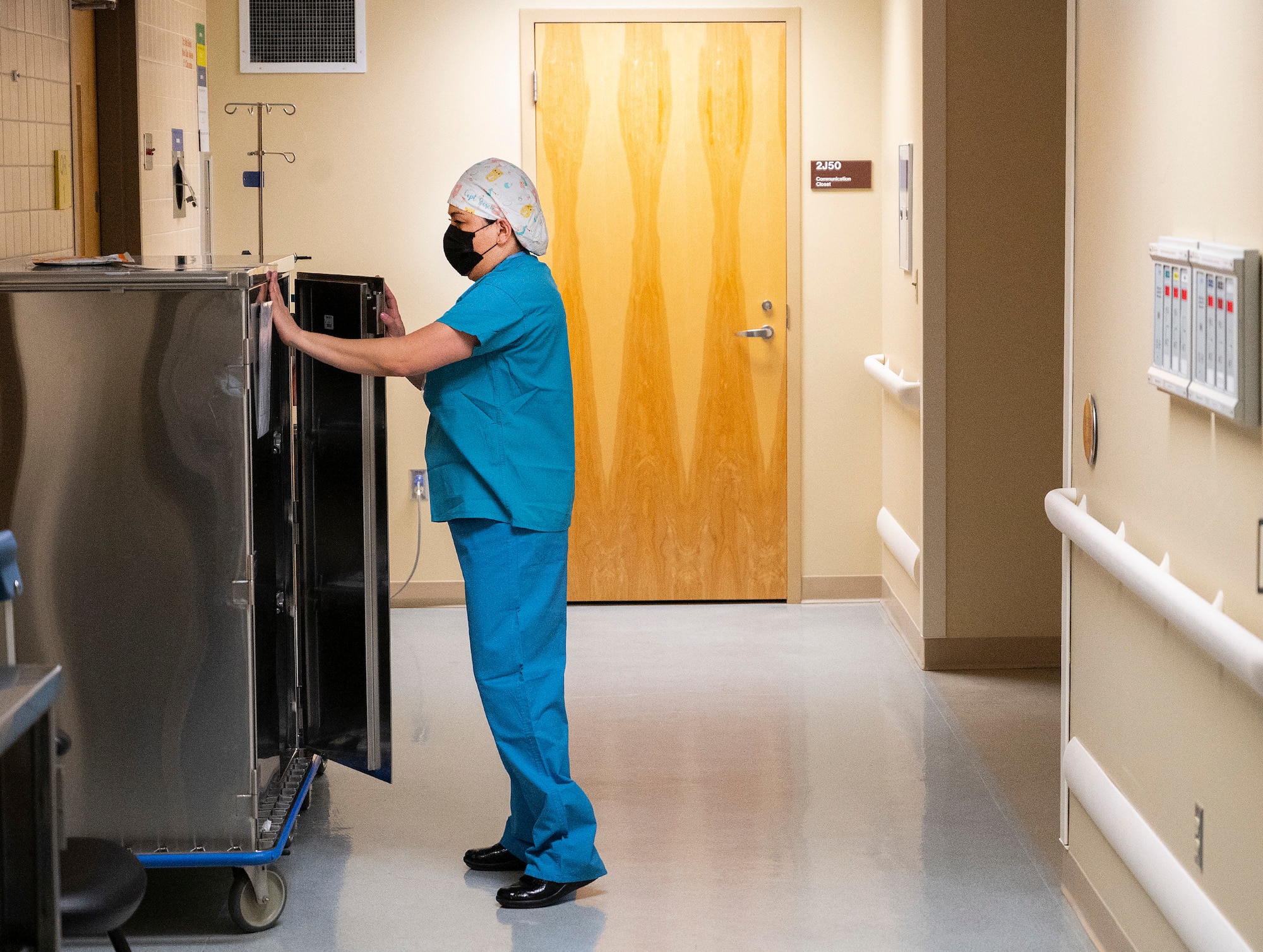 Capt. Dahlia Garcia, 88th Inpatient Operations Squadron charge nurse, checks the OR cart on Wright-Patterson Medical Center’s Labor and Delivery Ward at the start of her shift Dec. 15, 2021. The charge nurse’s start-of-shift checklist includes making sure the operating room is ready in case of an emergency. (U.S. Air Force photo by R.J. Oriez)
