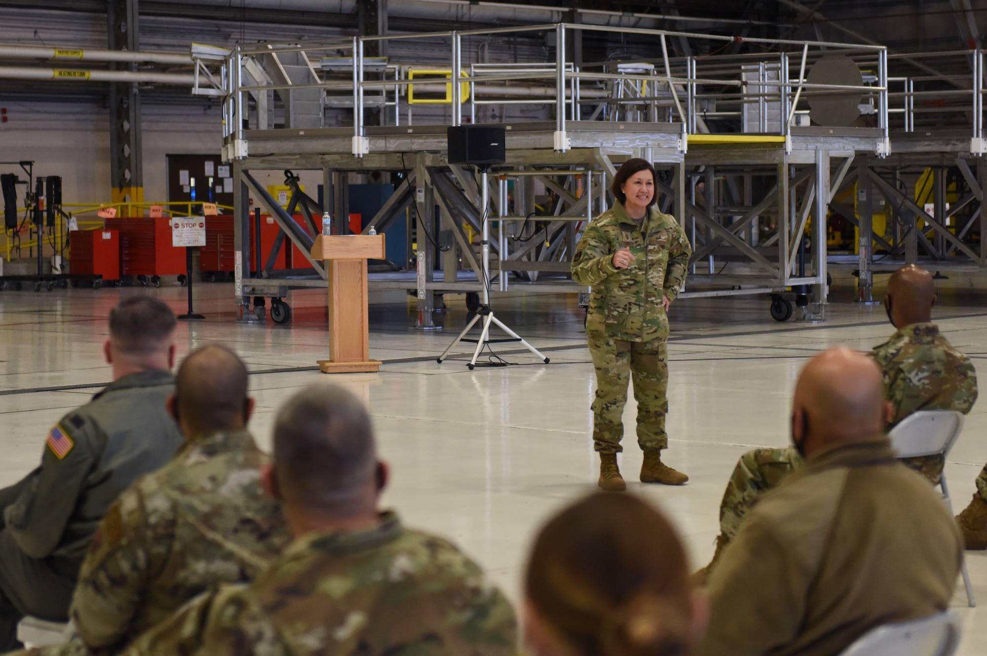 Chief Master Sergeant of the Air Force JoAnne S. Bass speaks to Team McChord Airmen during an all-call while visiting McChord Field at Joint Base Lewis-McChord, Washington, Feb. 2, 2022. During her visit, Bass toured several McChord units and recognized Airmen for excellent performance. (U.S. Air Force photo by Tech. Sgt. Benjamin Sutton)