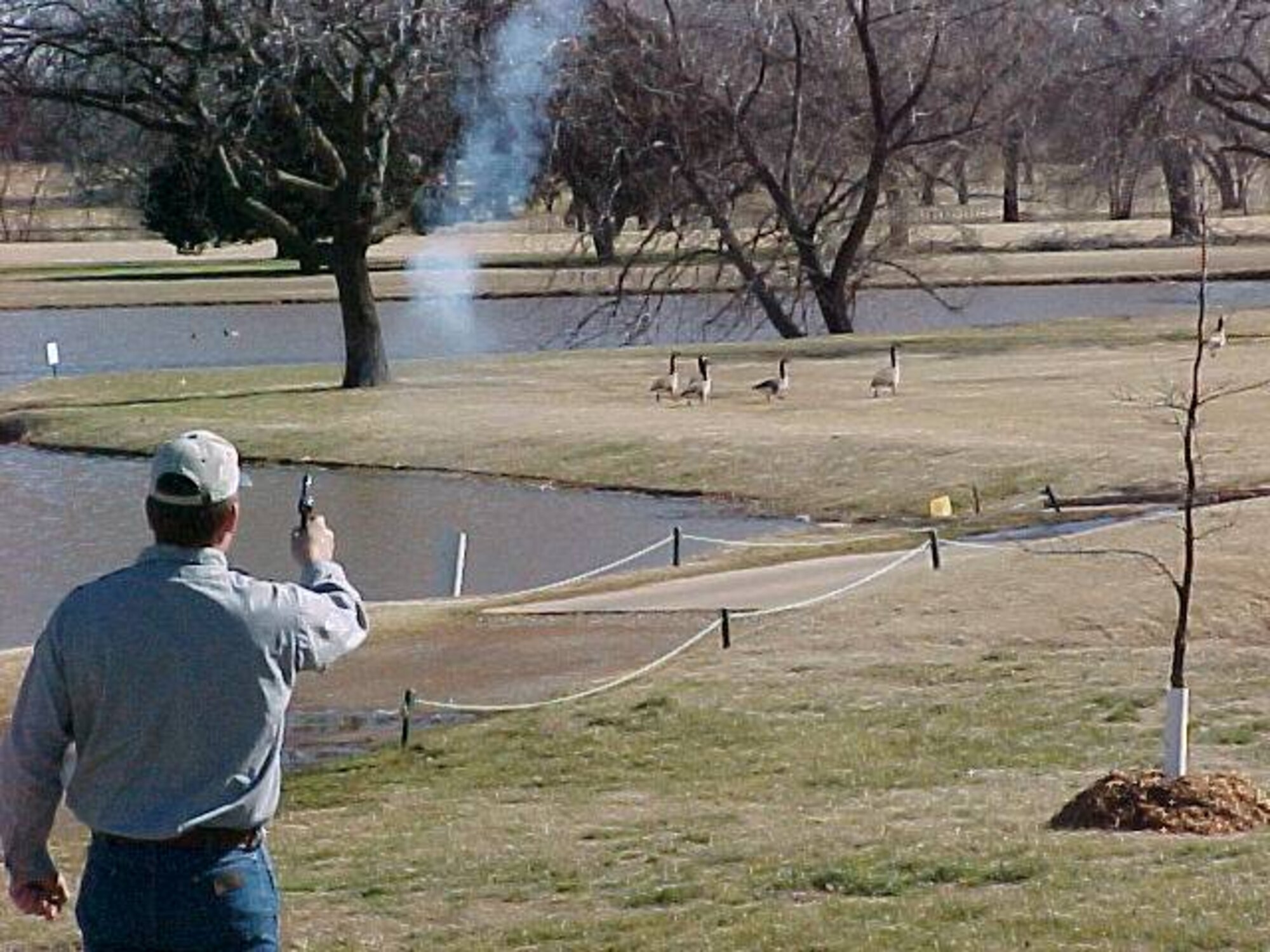 man shooting air gun
