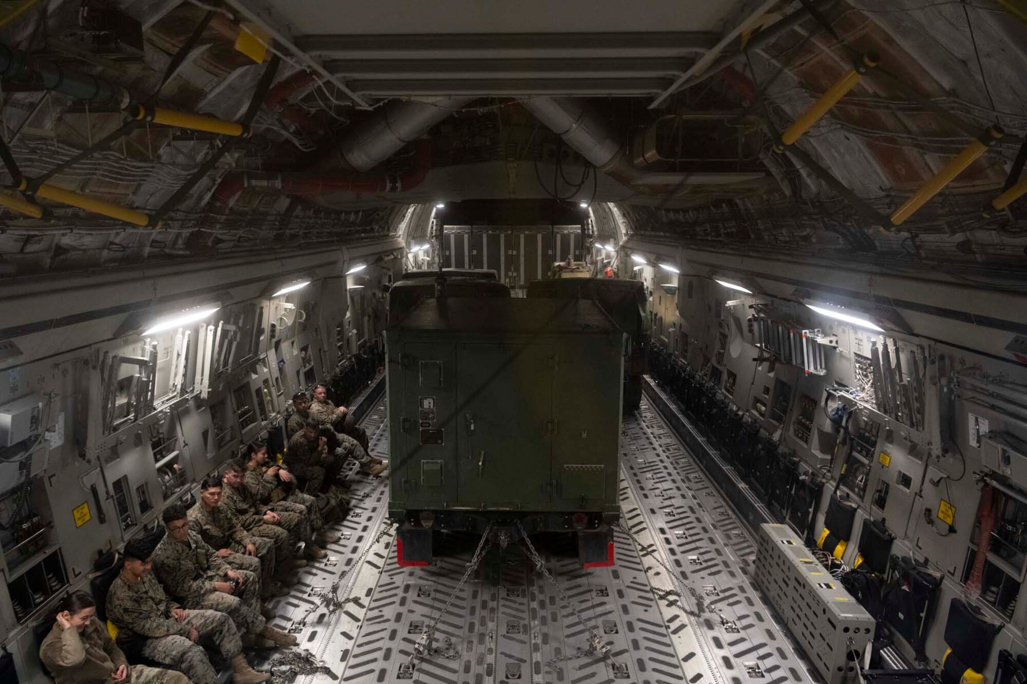 marines and vehicles in an aircraft