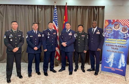Airmen of the Alaska Air National Guard, U.S. Air Force, and Mongolian Air Force pose for a photo during the 2021 Airmen to Airmen Talks program in Mongolia Nov. 15-17, 2021. A2AT provides an avenue to develop interoperability, foster military-to-military relations and improve bilateral cooperation. The U.S. and partner nation air forces conduct these engagements to plan for upcoming bilateral activities and establish partner goals. This is the second time the Alaska National Guard participated in the A2AT program with Mongolia, hosted by U.S. Pacific Air Forces. (Courtesy photo)