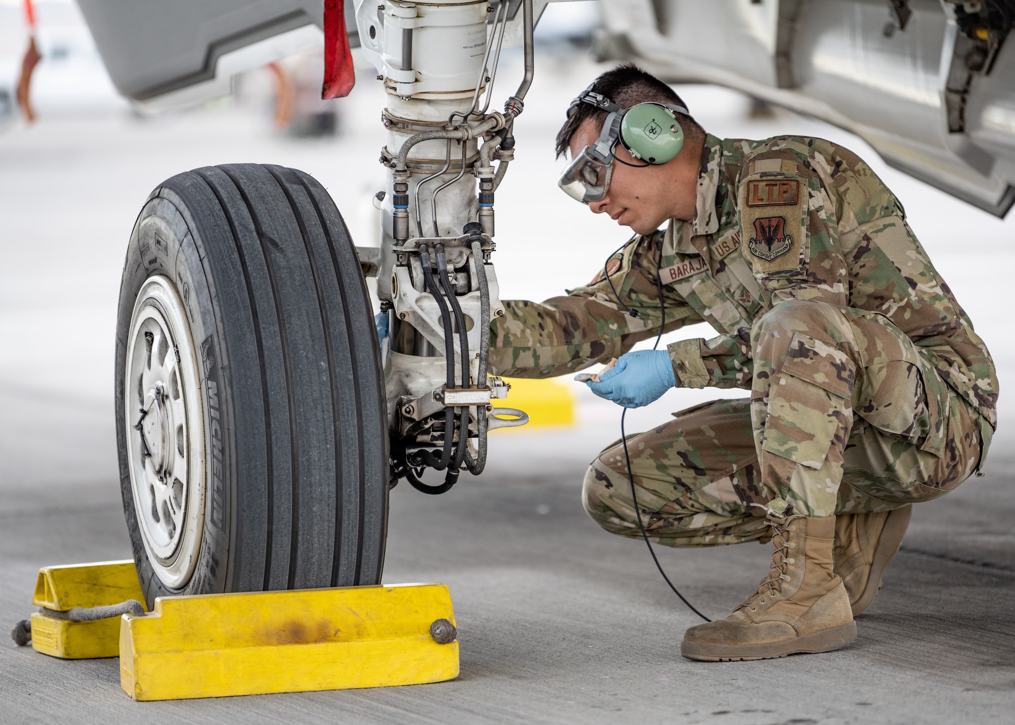 A photo of F-35 maintainers working on a jet