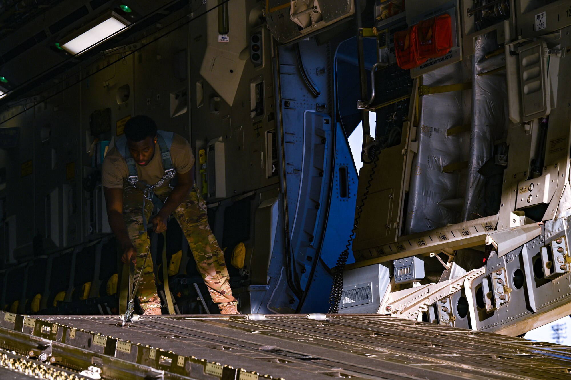 An Airman works inside a C-17 Globemaster III.