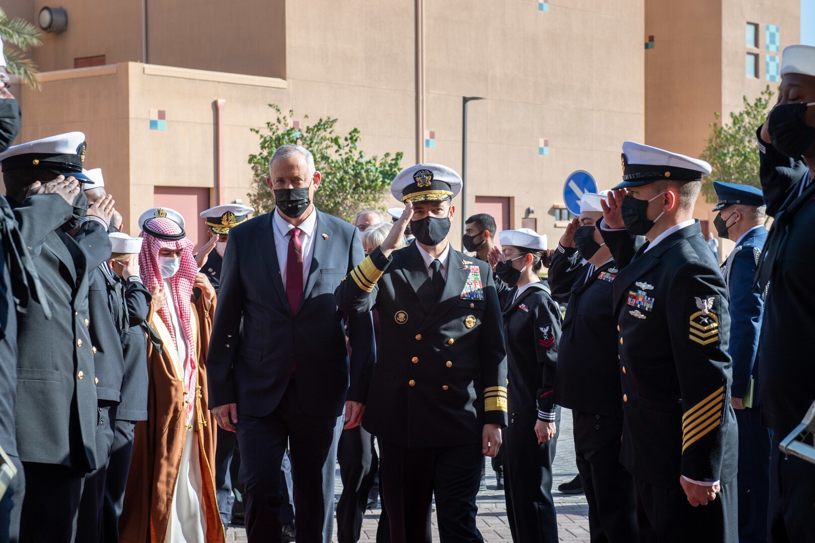 MANAMA, Bahrain (Feb. 3, 2022) Vice Adm. Brad Cooper, commander of U.S. Naval Forces Central Command, U.S. 5th Fleet and Combined Maritime Forces, center right, arrives with Israel Minister of Defense H.E. Benjamin Gantz and Bahrain Minister of Defense Affairs Abdulla bin Hasan Al Noaimi to U.S. 5th Fleet headquarters in Bahrain, Feb. 3. Cooper welcomed senior government officials from the United States, Bahrain and Israel for a trilateral meeting on regional maritime security cooperation. (U.S. Navy photo by Mass Communication Specialist 2nd Class Dawson Roth)