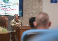 Maj. Gen. John W. Brennan, Jr., commander of Combined Joint Task Force- Operation Inherent Resolve, speaks to Iraqi and Coalition officials at the Joint Operations Command - Iraq annual review Dec. 27, 2021, in Baghdad, Iraq. Coalition officials discussed the past year as the organization completed its combat mission and transitioned to advising, assisting and enabling Iraqi Forces, at the invitation of Iraq, to maintain the enduring defeat of Daesh. (U.S. Air Force photo by Senior Airman Hanah Abercrombie)