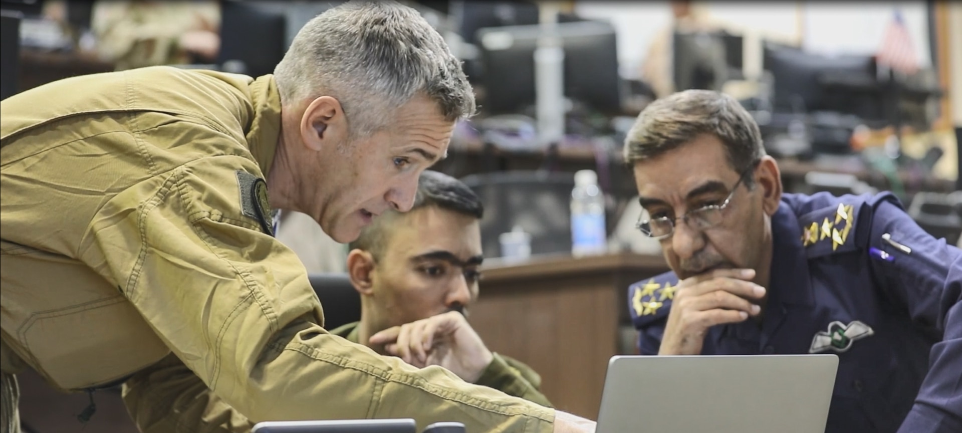 A French Air Force Air Advisor, part of the Military Advisory Group, advises Iraqi partner forces at the Joint Operation Center - Iraq in Baghdad, Iraq, Dec. 1, 2021. All Coalition activities are in line with the Combined Joint Task Force - Operation Inherent Resolve’s new 2022 Campaign Plan, as the Coalition continues its core mandate to maintain the enduring defeat of Daesh; by, with, and through partner forces that is made possible by Coalition advice, assistance, and enablement. (U.S. Army photo by Cpl. Jacob Gleich)