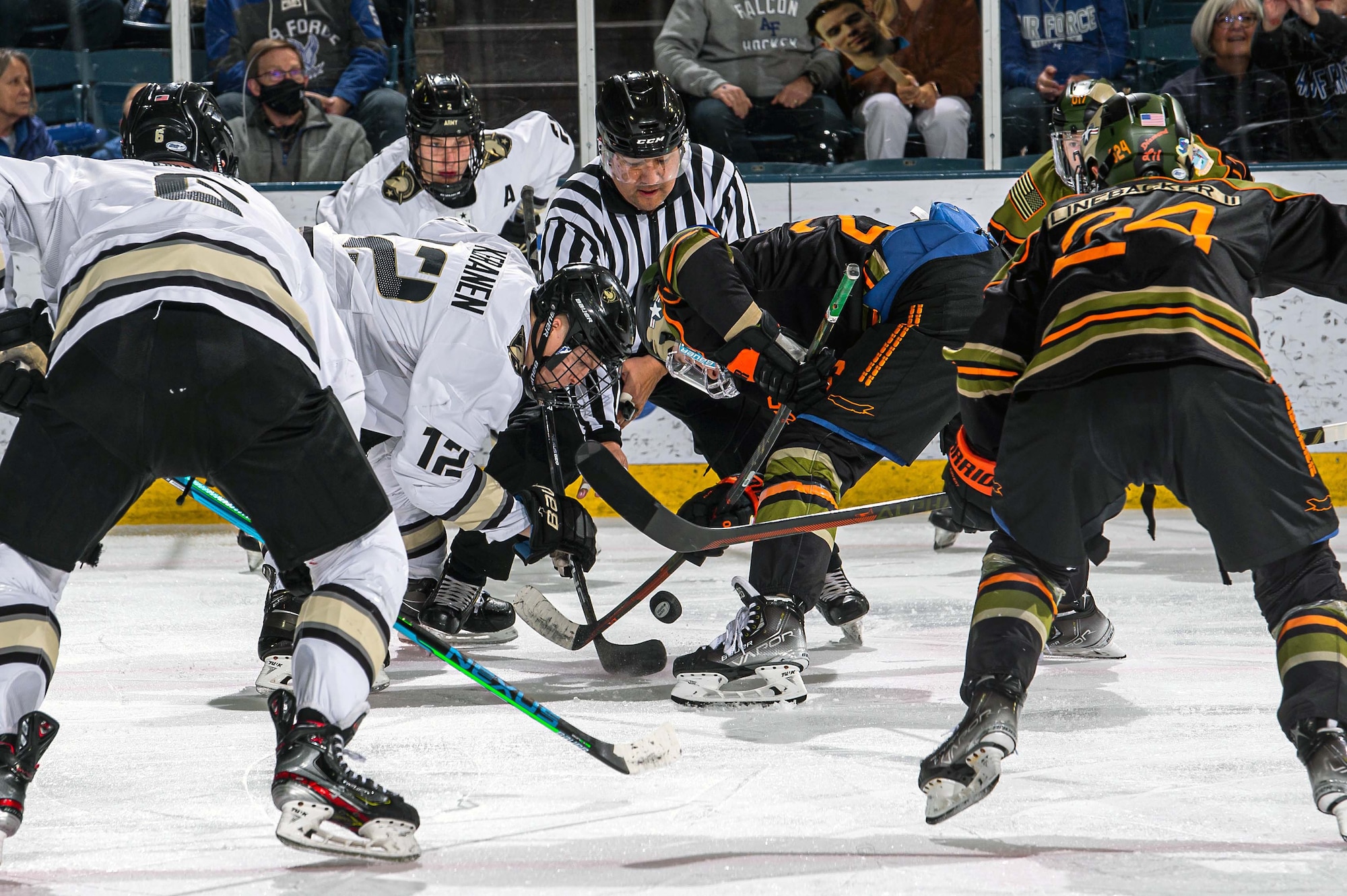 Air Force's Clayton Cosentino and Army's John Keranen faceoff during a game