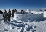 Airmen from the New York Air National Guard’s 109th Airlift Wing take part in Barren Land Arctic Survival Training at Raven Camp, Greenland. Students spend three days on the polar icecap learning to survive in barren arctic conditions.