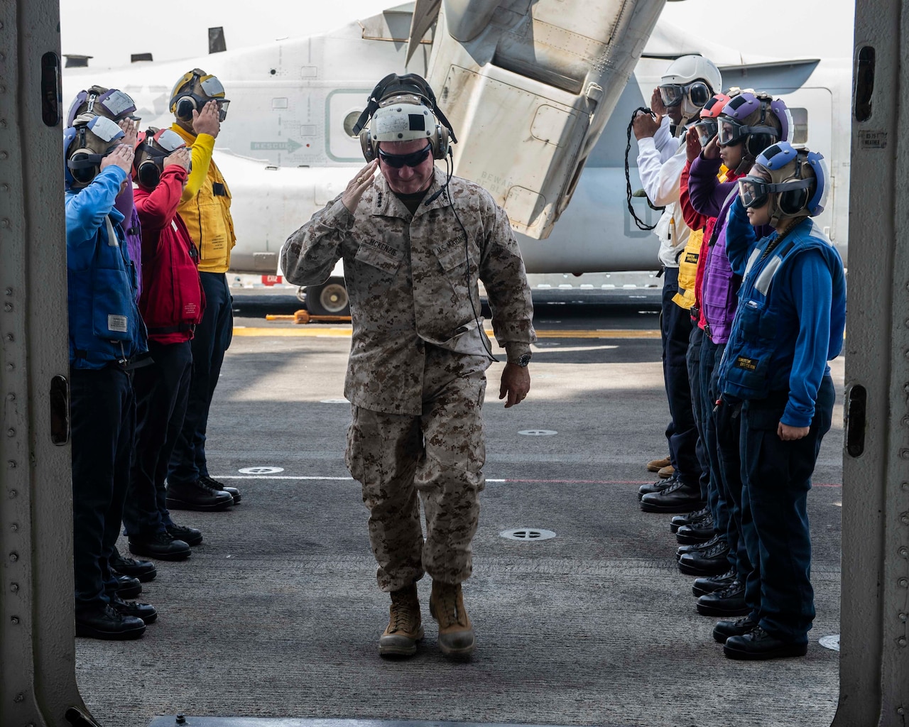 Marine Corps Gen. Kenneth McKenzie Jr. boards amphibious assault ship USS Boxer.