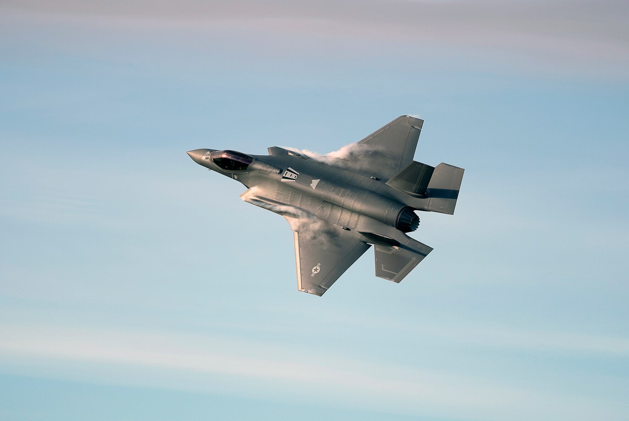 An F-35A Lightning II, assigned to the 495th Fighter Squadron, flies above Royal Air Force Lakenheath, United Kingdom