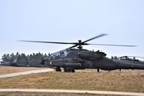 An AH-64D Apache attack helicopter attached to Task Force Lobos, 2nd Battalion, 2-227th Aviation Regiment, 1st Air Cavalry Brigade, 1st Cavalry Division, prepares to depart the airfield, Jan. 27, Joint Multinational Readiness Center, Hohenfels Training Area, Germany. The 2-227th is participating in Allied Spirit 22, an exercise comprising over 5000 Soldiers from 15 nations that is designed to enable integration of the U.S. military and its allies in a competitive combat training environment. (U.S. Army Photo by Capt. Alun Thomas, 201st Theater Public Affairs Support Element)