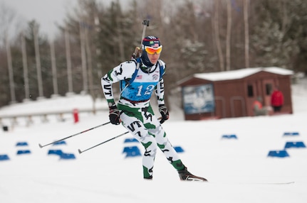 U.S. Army Pfc. Jordan McElroy, a member of the Vermont National Guard, competes in the junior men's sprint biathlon race at the Ethan Allen Firing Range, Jericho, Vermont, March 2, 2014. More than 140 athletes from 21 different states are participating in the 2014 Chief of the National Guard Bureau Championships. (U.S. Air National Guard photo by Staff Sgt. Sarah Mattison)